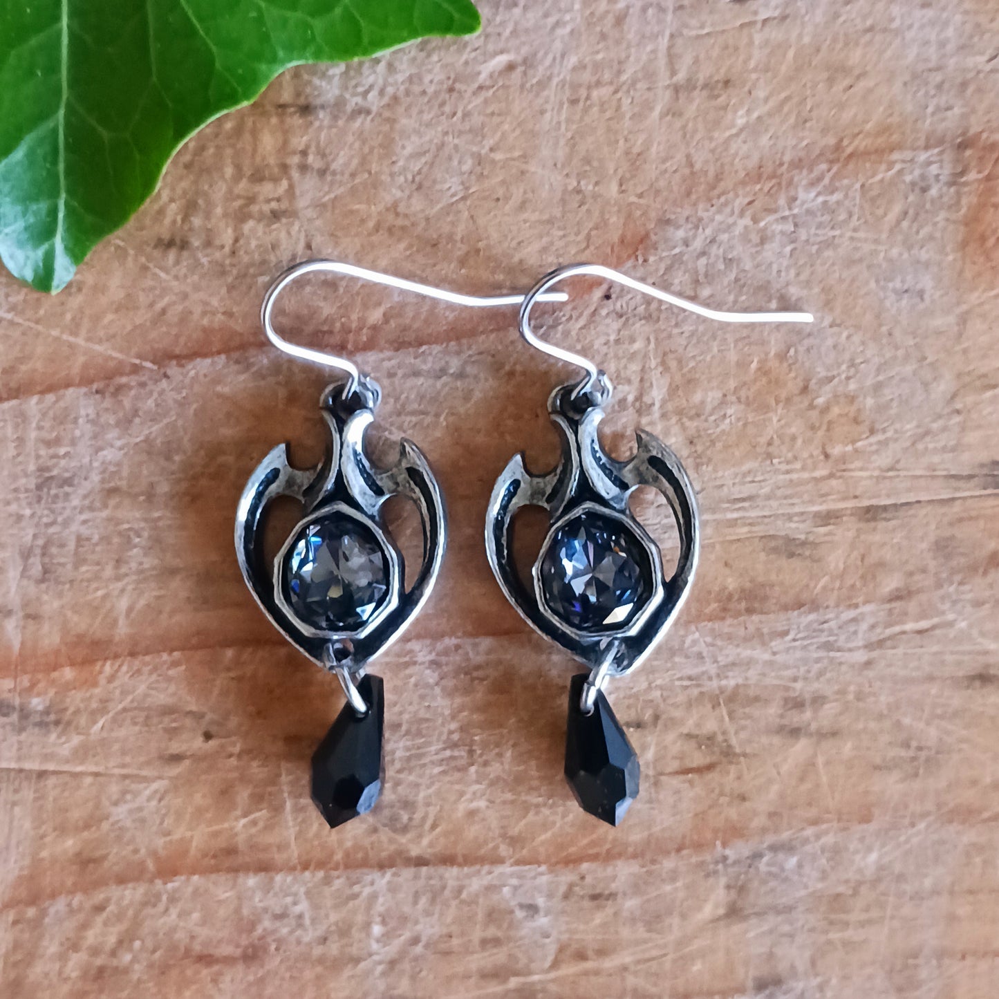Experience timeless elegance with our Enchanting Baroque Earrings. Handcrafted with meticulous attention to detail, these earrings showcase intricate designs inspired by the romance and mystery of the Baroque era. Each piece is adorned with fine Austrian cut crystals that sparkle with captivating brilliance, reflecting light like moonlight on a tranquil night. 