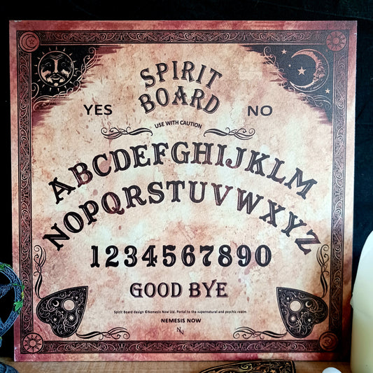 Explore the mysterious world of the occult with this Antiqued Beige Spirit Board, designed by renowned fantasy artist Lisa Parker in partnership with Nemesis Now. With its aged sepia finish and intricate baroque-style border, this atmospheric spirit board makes a striking addition to an occult collection, altar or gothic-inspired home.