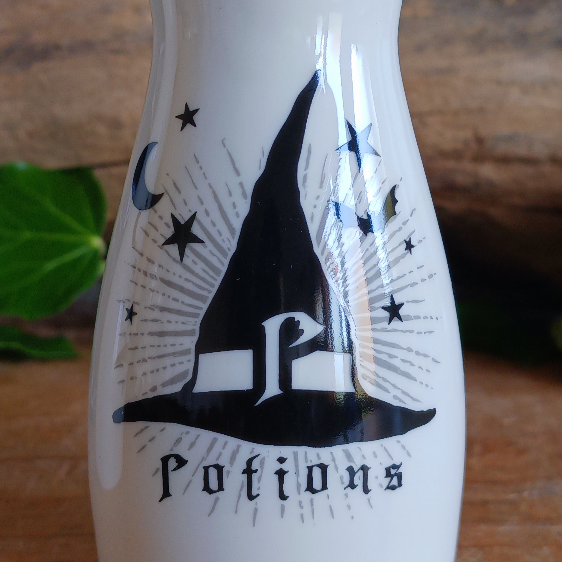 Bring dark elegance and mystical charm to your table with this Gothic-themed fine bone china salt and pepper shaker set by Alchemy England. Designed for lovers of witchy aesthetics and magical symbolism, this unique set features an engraved “S” for Spells and “P” for Potions, making it both functional and conversation-starting.