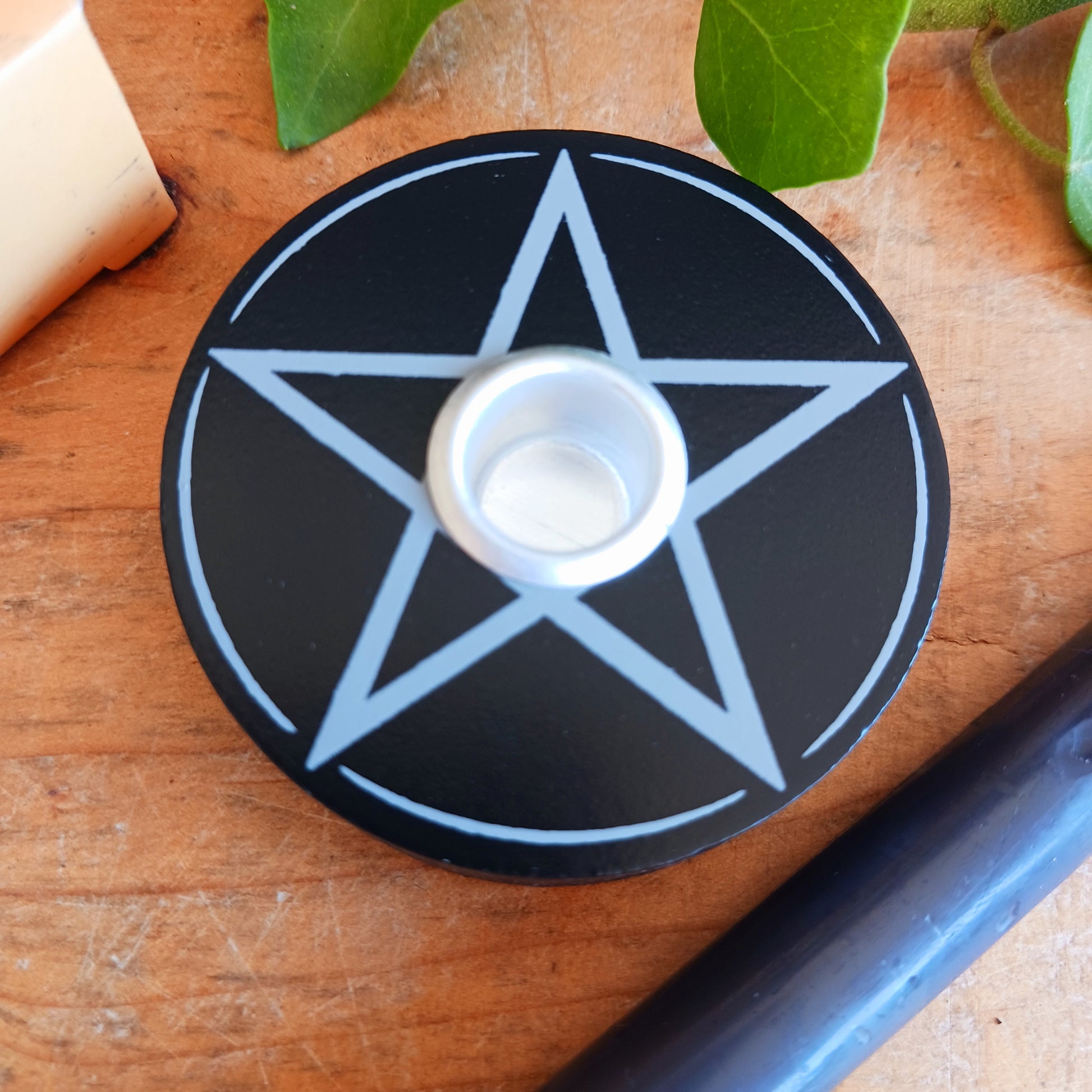 Featuring a striking Pentagram design, this spell candle holder is perfectly sized for holding a single spell candle while it burns during magical workings, rituals and spell casting. A practical and atmospheric addition to any witchcraft altar, sacred space or mystical home décor collection.