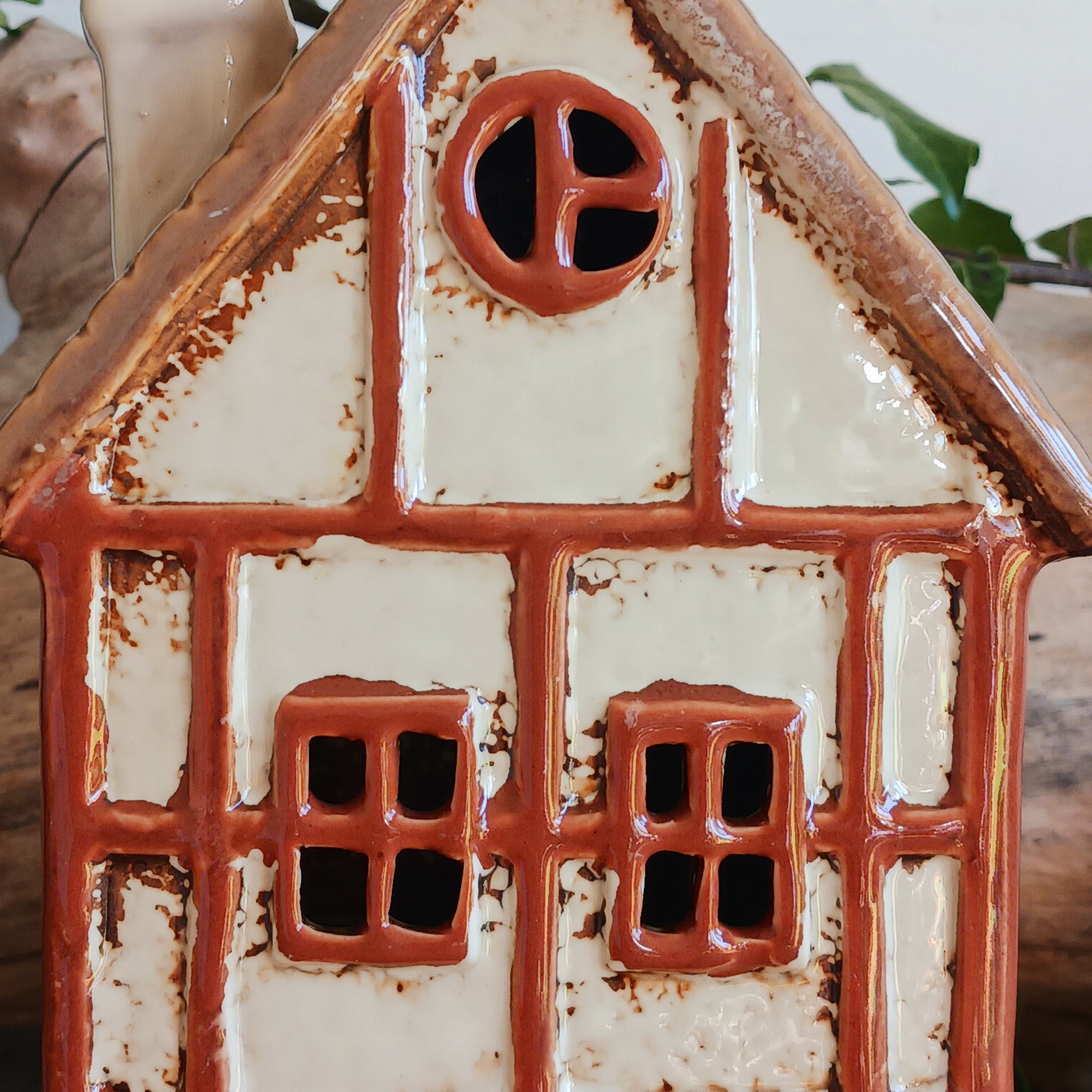 A lantern-lit refuge upon an enchanted street, the Tudor Ship Inn glows with the warmth of stories carried on twilight air. This Shudehill Village Pottery tealight house is crafted from ceramic, its windows flickering with candlelight like a haven for wandering souls.