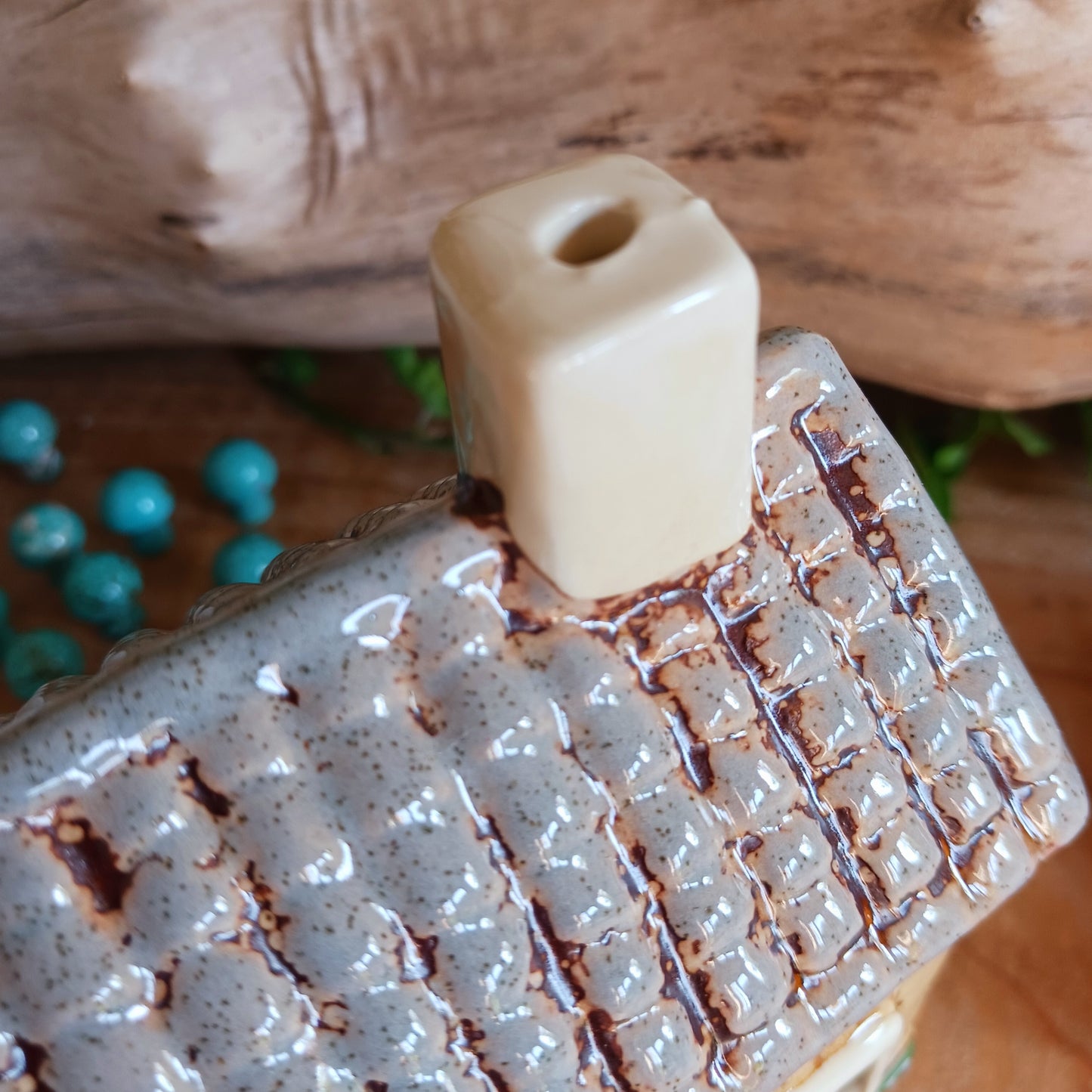 Illuminate your home with the charming Village Pottery Green Grocers Shop Tealight Holder. Handcrafted with a rustic green finish, this cosy piece adds warmth and ambience to any room. Perfect for tealights or simply as a decorative ornament, it’s a delightful addition to shelves, windowsills, or coffee tables. Pair with other pieces from the Village Pottery Collection to create your own quaint, decorative village.