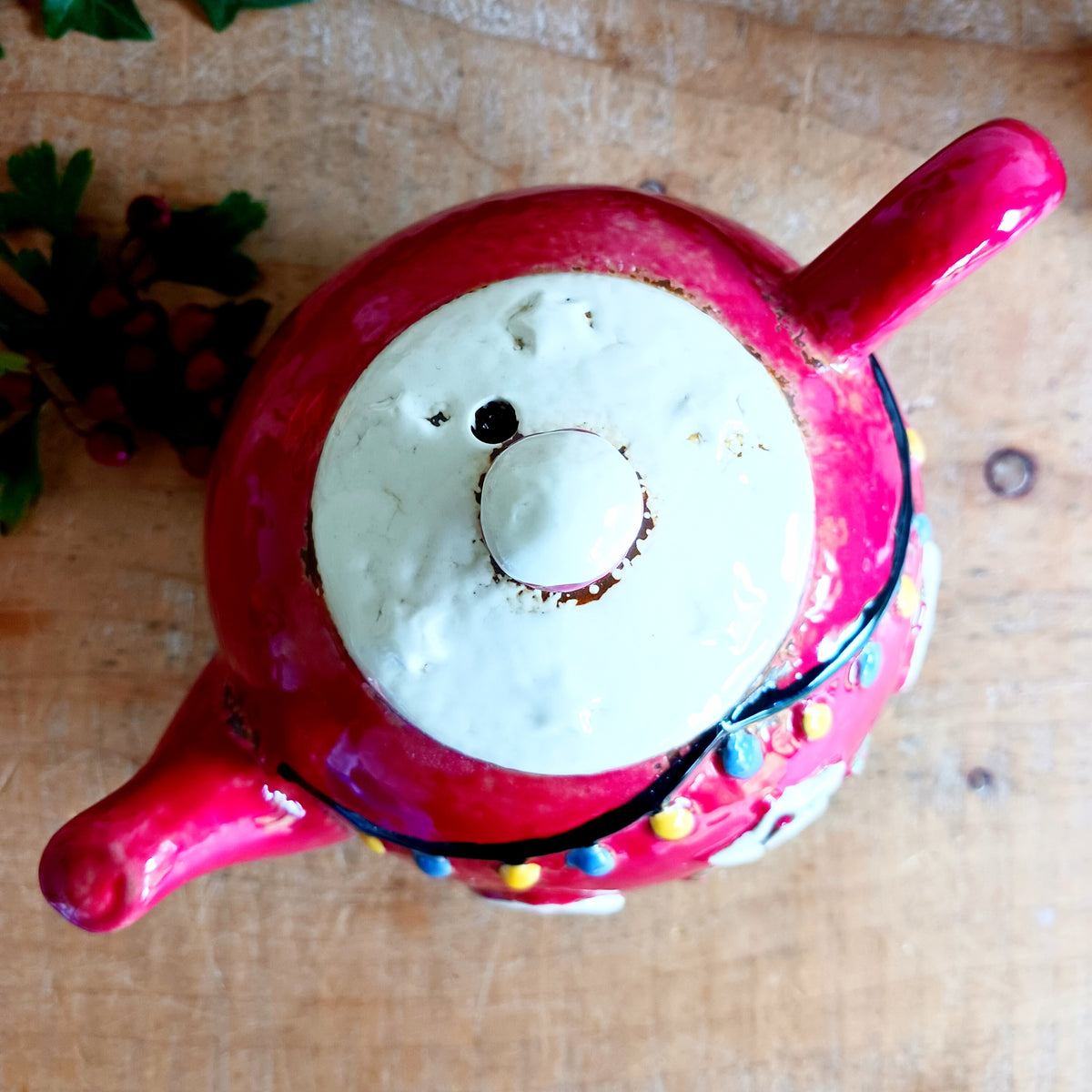 Add a touch of charm and character to your festive display with the Village Pottery Xmas Teapot House Tealight. Combining the familiar shape of a traditional teapot with the appearance of a miniature Christmas house, this unusual decorative tealight holder makes a delightful addition to your seasonal décor.