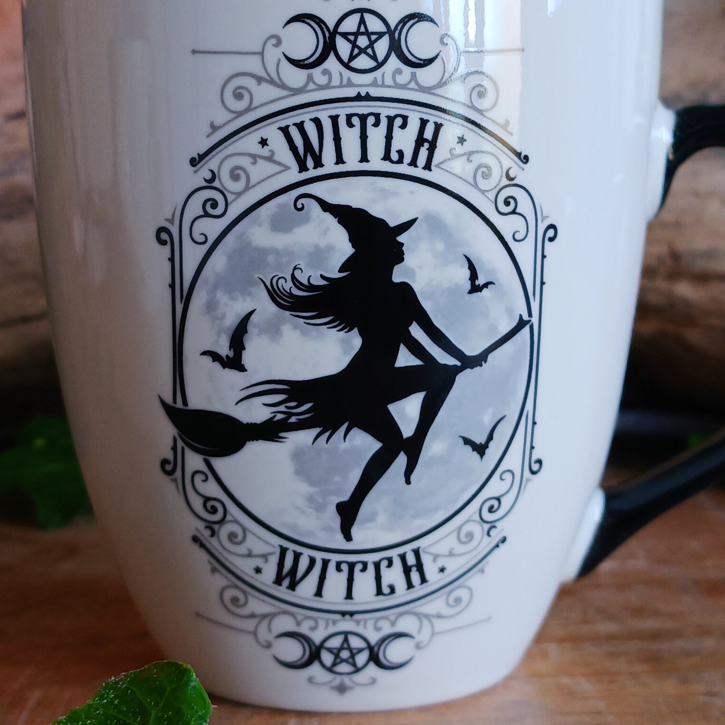 When the moon rises and the stars awaken, the Midnight Witch takes flight. Glide through twilight skies with this enchanting Witch Mug by Alchemy, a perfect blend of gothic charm and whimsical magic.