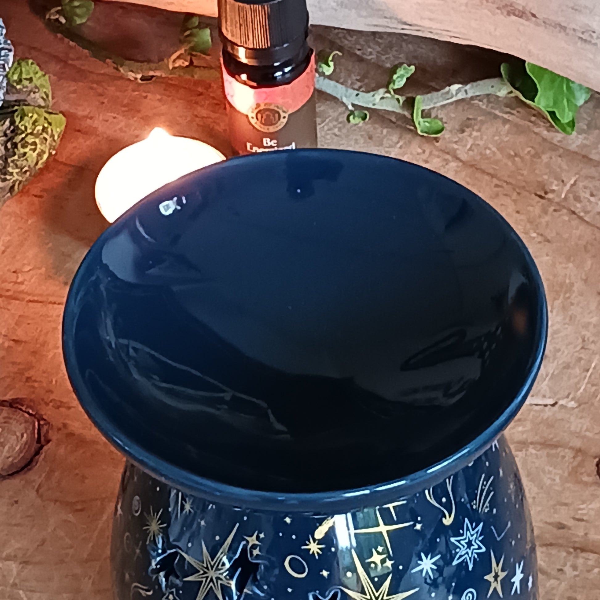 Bring a touch of celestial magic to your space with our beautifully designed ceramic oil burner and wax warmer. Featuring a captivating starry night pattern, this piece casts a warm, dreamy glow while melting wax melts or diffusing fragrance oils. Perfect for Christmas or year-round décor, it creates an inviting atmosphere in any room. 