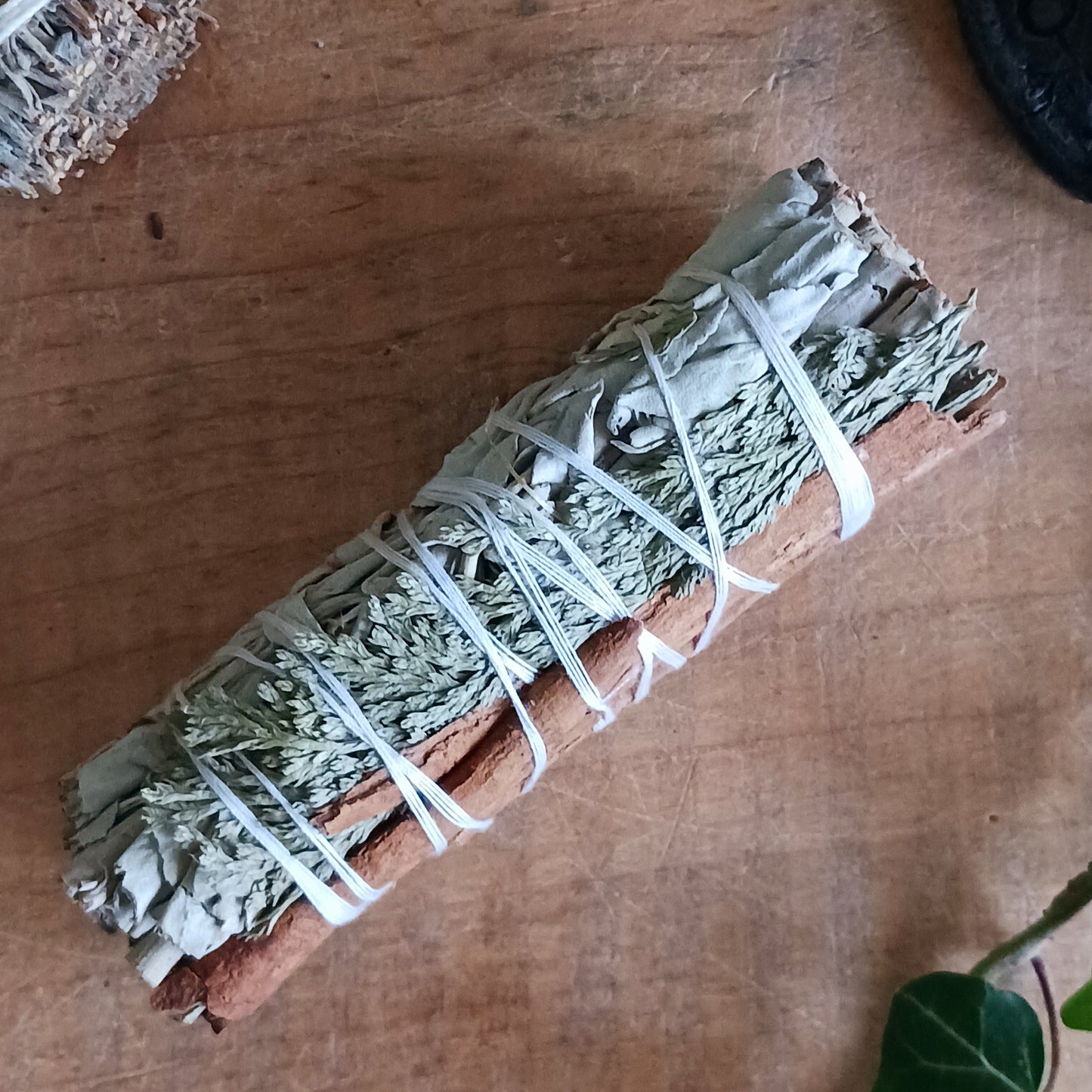 This smudge stick features a combination of three sacred herbs, White Sage, Cedar and Cinnamon.