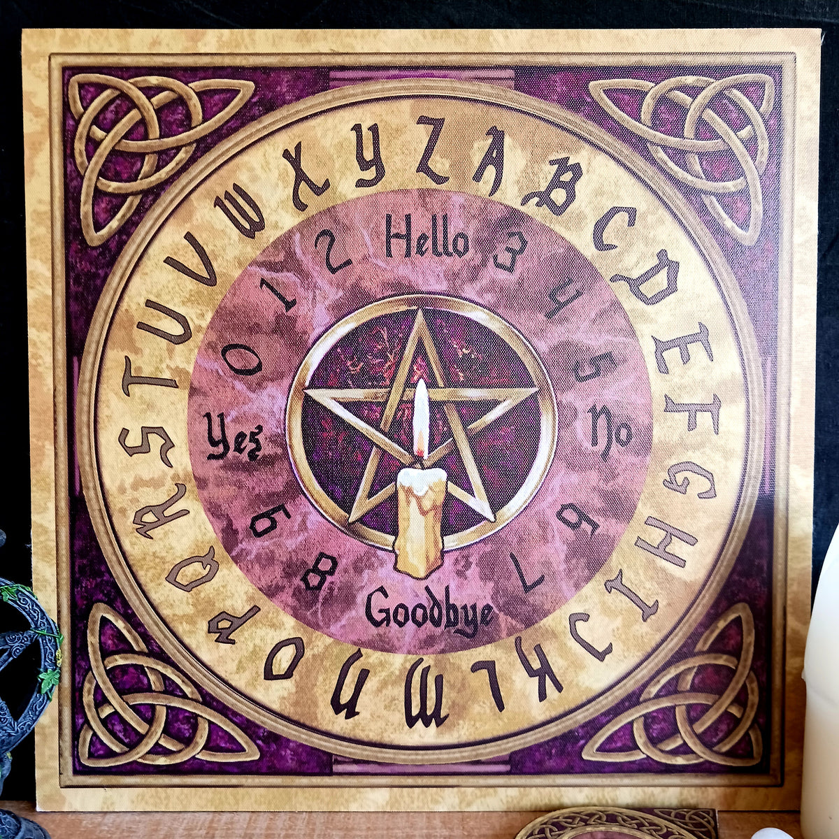 Explore the mystical world of spirit boards with this beautifully decorated Golden Celtic Pentagram Spirit Board, featuring a dark purple marbled-effect background, intricate golden detailing and traditional Celtic symbolism.