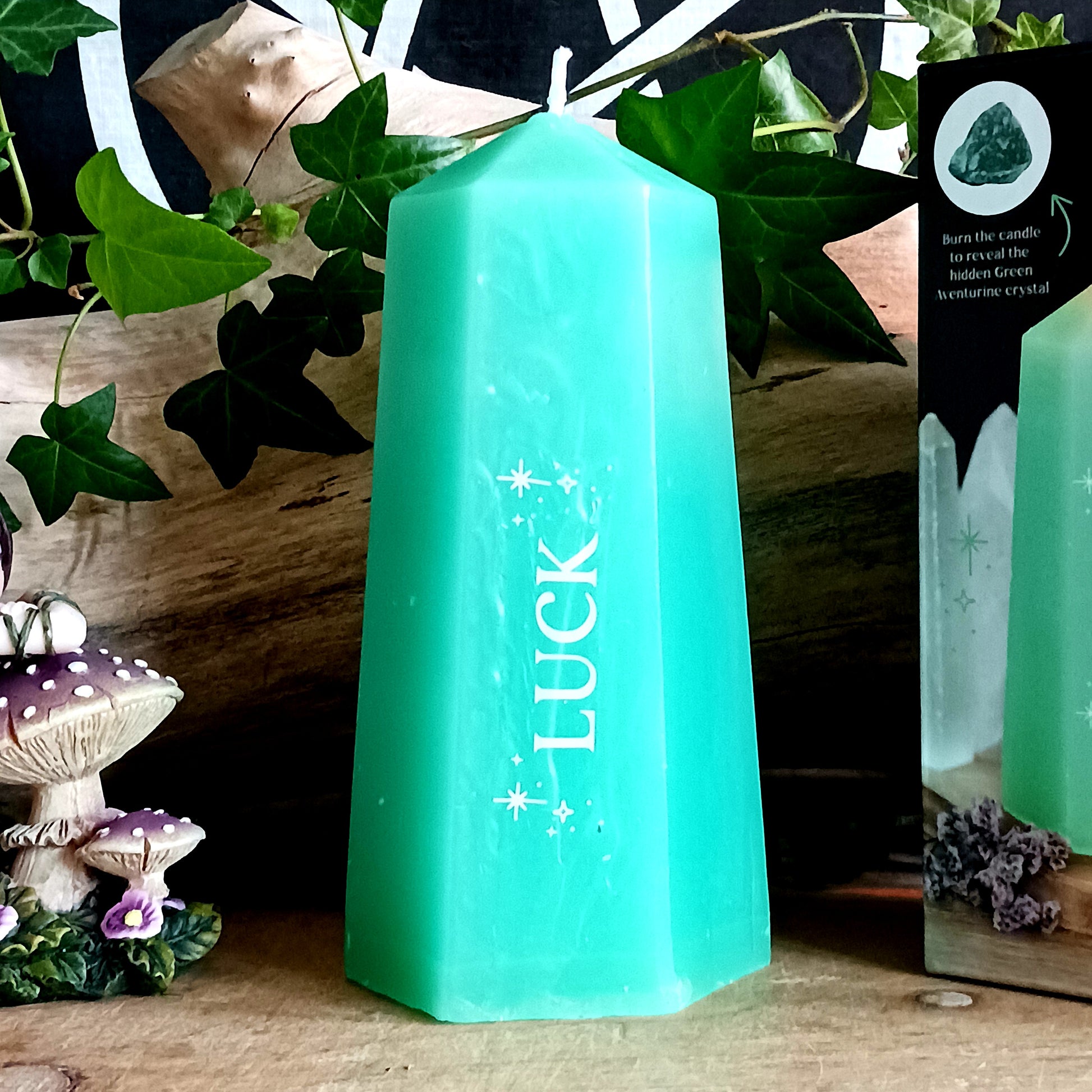 Invite prosperity, positive energy, and spiritual abundance into your space with the Luck Crystal Candle with Hidden Aventurine. Beautifully shaped like a vibrant green crystal tower, this unique candle is designed to inspire intention setting, manifestation, and mindful rituals.