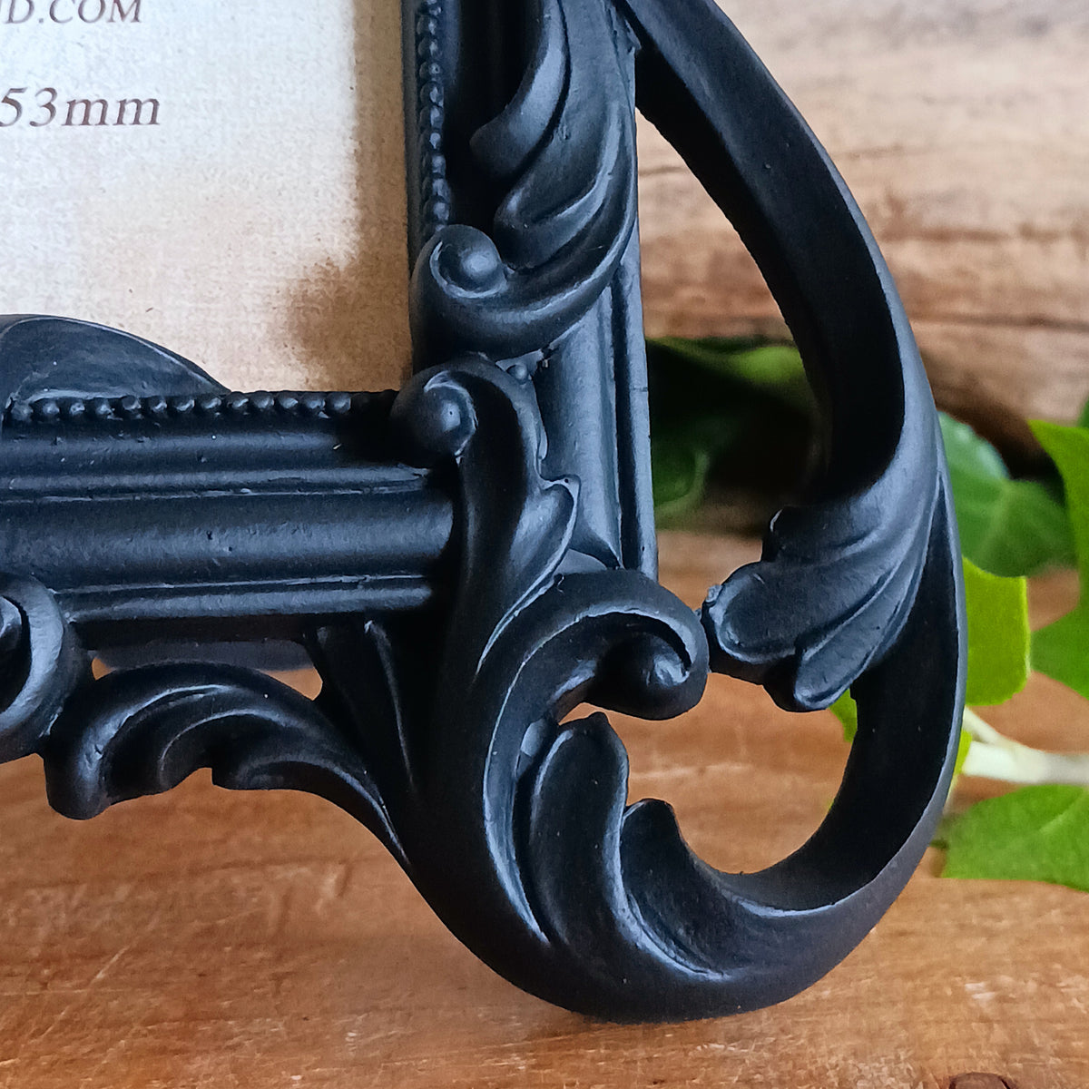 Add a touch of dark elegance to your home with this ornate Black Rococo Photo Frame. Inspired by the opulence of a bygone era, this decorative resin frame features elaborate scrollwork, flowing curves and a dramatic black finish, creating a striking statement piece for gothic, vintage and alternative interiors.