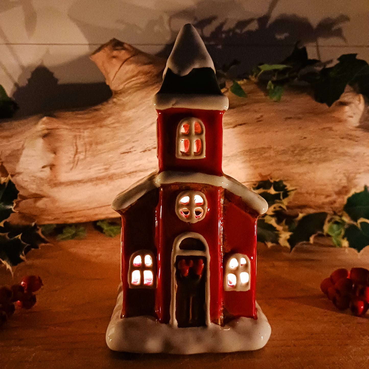 Handcrafted in the Village Pottery workshop, this charming Little Christmas Church Ceramic Tealight Holder brings traditional festive magic into your home. Made from high-quality ceramic with intricate detailing, it captures the timeless beauty of a snow-covered village church.