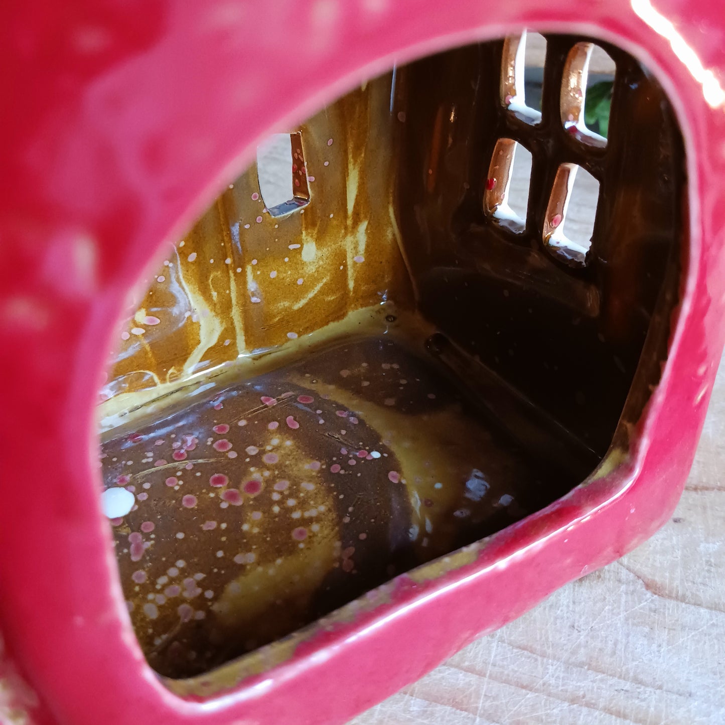 Bring the warmth and magic of Christmas into your home with this handcrafted Christmas Wreath House Tealight Holder from the Village Pottery collection. Made from high-quality ceramic and decorated with a classic wreath and rustic detailing, this piece evokes the charm of a snowy winter’s evening.