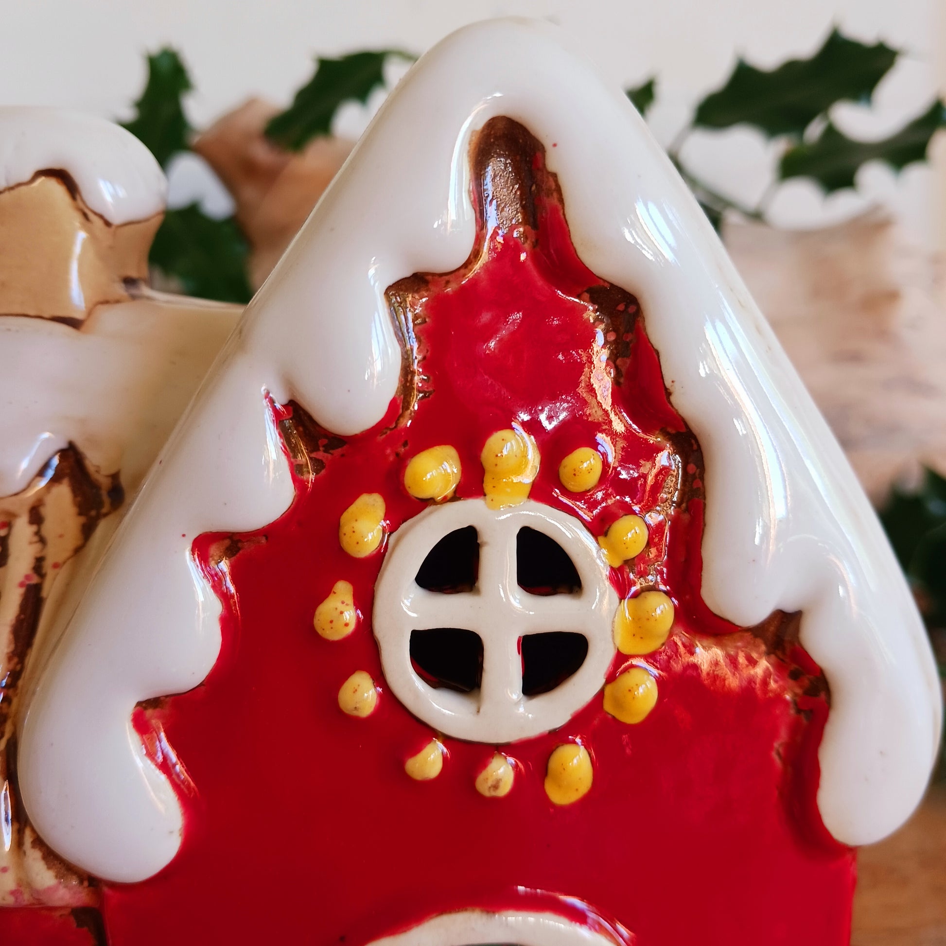 Fill your home with the warmth and wonder of the season with the Village Pottery Christmas Round Window House Tealight Holder, a beautifully handcrafted ceramic creation glowing with festive spirit. Measuring 14.5 x 13.5 x 8.5 cm, this charming house captures the cosy magic of a winter’s night, where light glows softly through the rounded windows like starlight in the snow.