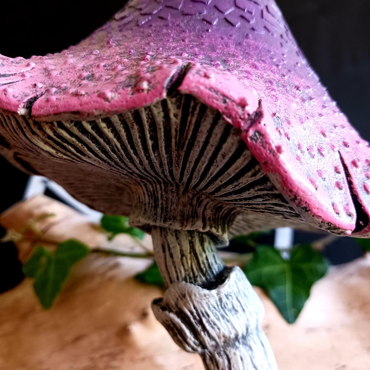 Bring a touch of magic and whimsical charm to your home with Twizzle Tumblethorne, a wonderfully quirky purple mushroom sculpture perfect for lovers of fantasy, fairies and nature-inspired decor.