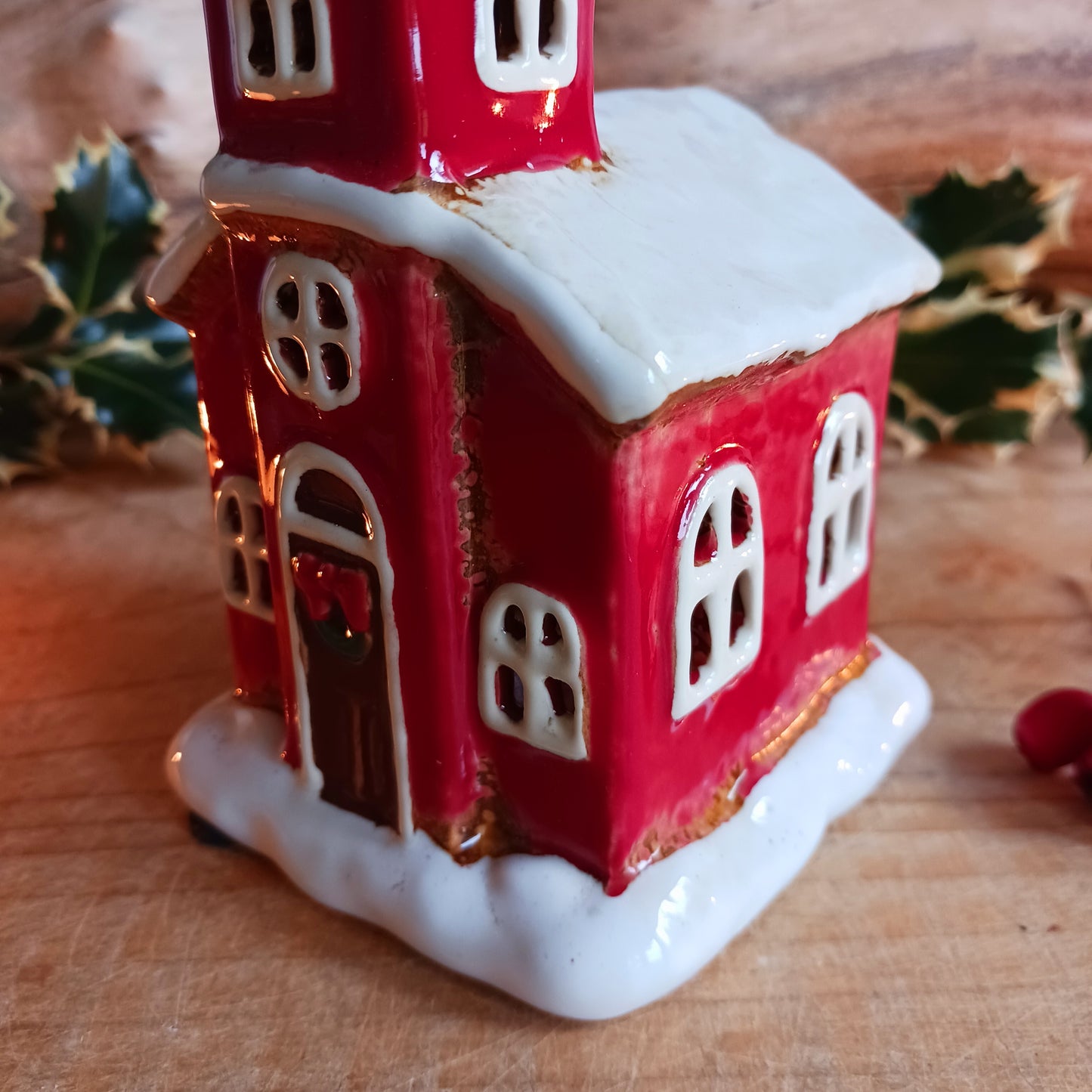 Handcrafted in the Village Pottery workshop, this charming Little Christmas Church Ceramic Tealight Holder brings traditional festive magic into your home. Made from high-quality ceramic with intricate detailing, it captures the timeless beauty of a snow-covered village church.