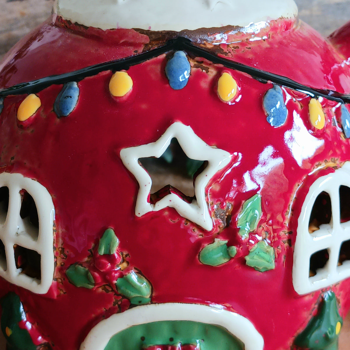 Add a touch of charm and character to your festive display with the Village Pottery Xmas Teapot House Tealight. Combining the familiar shape of a traditional teapot with the appearance of a miniature Christmas house, this unusual decorative tealight holder makes a delightful addition to your seasonal décor.