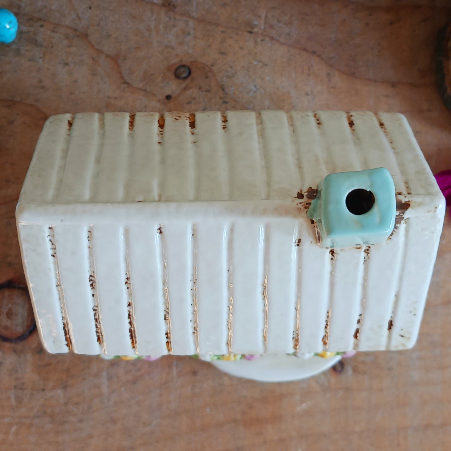 Transform your home into a warm and inviting sanctuary with the Village Pottery Gift Shop Tealight Holder. Crafted from quality ceramic, this charming piece creates a cosy, nostalgic glow when lit with a tealight. More than just a candle holder, it doubles as a delightful decorative ornament for your coffee table, shelf, or windowsill.