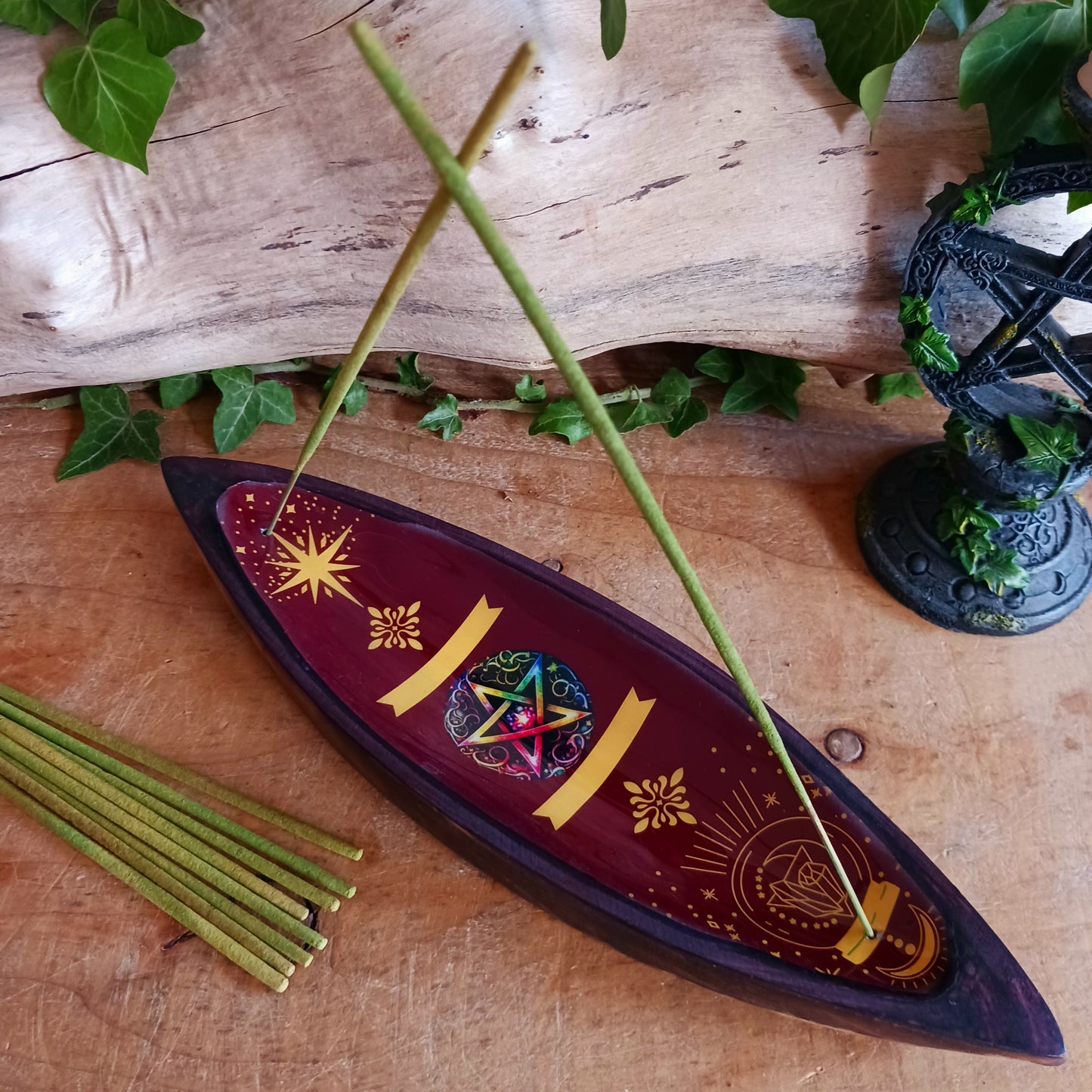 Channel mystical energy into your sacred space with this beautifully crafted Enamel Pentagram Incense Bowl. Featuring a vivid red enamel design with a central pentagram surrounded by celestial and elemental symbols, this striking incense holder is perfect for those who embrace witchcraft, Wiccan traditions, pagan spirituality, or magical rituals.