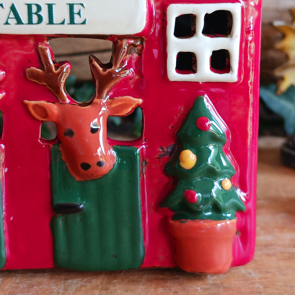 Bring a touch of festive village charm to your home with the Village Pottery Xmas Rudolph’s Stable Tealight Holder. This delightful ceramic Christmas decoration is designed as a quaint little stable, featuring a snowy roof, traditional green doors and charming reindeer detailing.