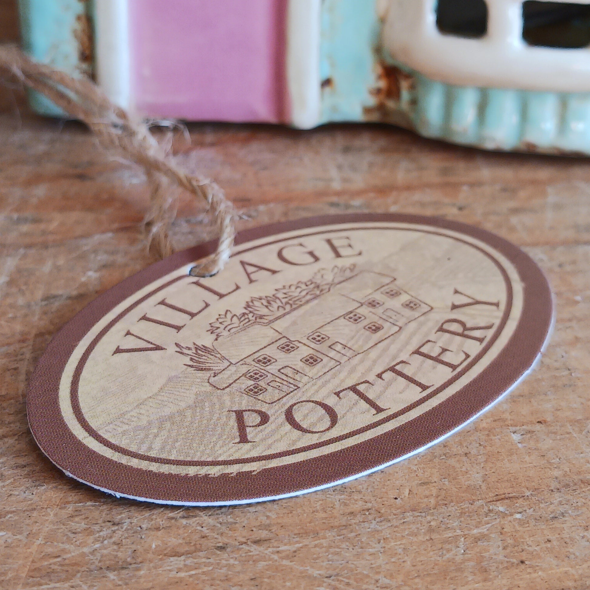 Transform your home into a warm and inviting sanctuary with the Village Pottery Gift Shop Tealight Holder. Crafted from quality ceramic, this charming piece creates a cosy, nostalgic glow when lit with a tealight. More than just a candle holder, it doubles as a delightful decorative ornament for your coffee table, shelf, or windowsill.